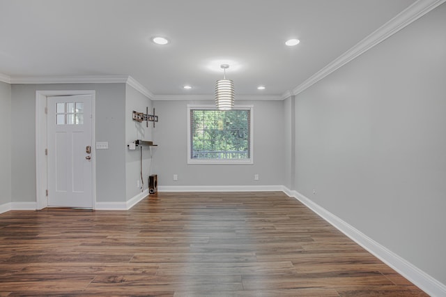 entryway featuring dark hardwood / wood-style floors and ornamental molding