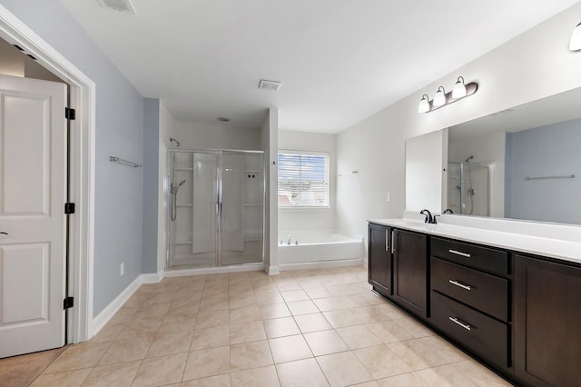 158 Netherfield Dr, Summerville, SC 29486 - full bathroom with a stall shower, vanity, a garden tub, and tile patterned floors