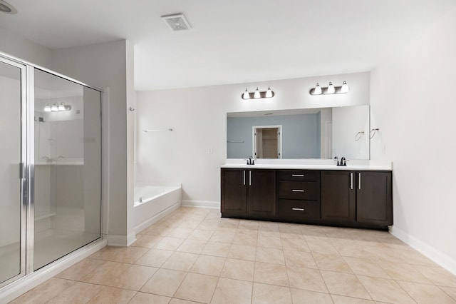 158 Netherfield Dr, Summerville, SC 29486 - bathroom featuring a garden tub, double vanity, tile patterned floors, and a shower stall