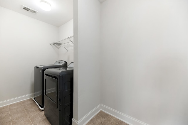 158 Netherfield Dr, Summerville, SC 29486 - washroom with washer and dryer and light tile patterned floors