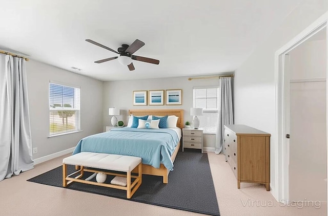 158 Netherfield Dr, Summerville, SC 29486 - bedroom featuring multiple windows, a ceiling fan, and light carpet