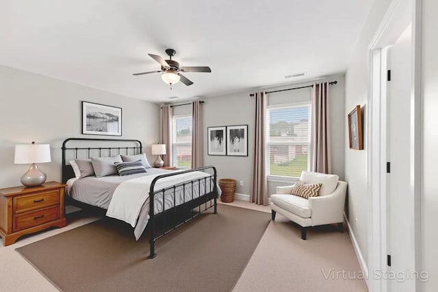 158 Netherfield Dr, Summerville, SC 29486 - carpeted bedroom featuring multiple windows and a ceiling fan
