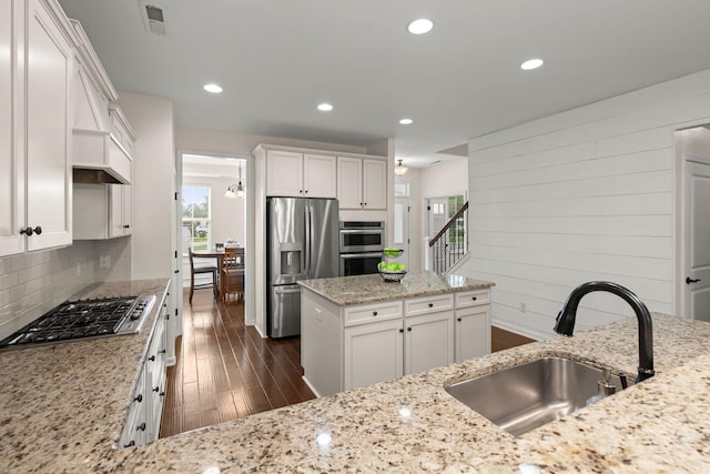 1870 Gammon St, Charleston, SC 29414 - kitchen with appliances with stainless steel finishes, a sink, plenty of natural light, light stone countertops, and recessed lighting