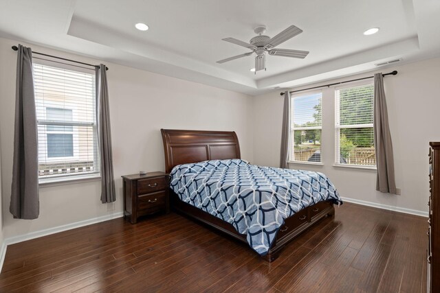 1870 Gammon St, Charleston, SC 29414 - bedroom featuring a tray ceiling, baseboards, dark wood-style floors, recessed lighting, and a ceiling fan
