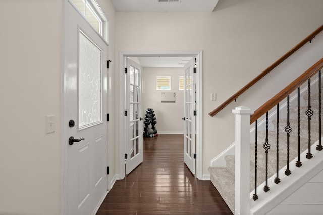 1870 Gammon St, Charleston, SC 29414 - entrance foyer featuring french doors, dark wood-style flooring, stairs, and baseboards