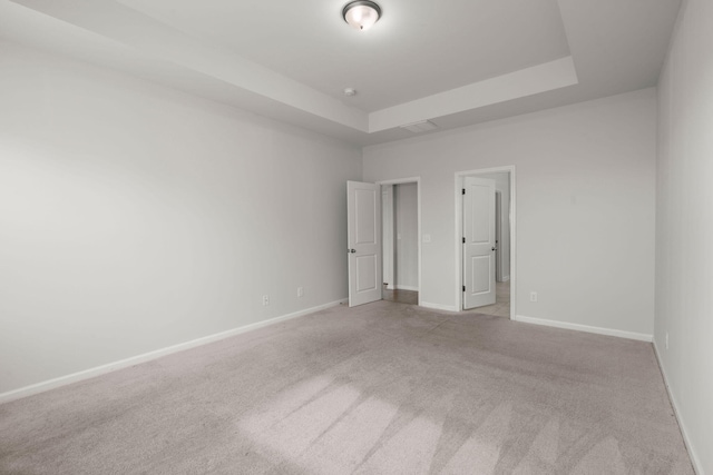 341 Witch Hazel St, Summerville, SC 29486 - empty room with light colored carpet, a tray ceiling, baseboards, and a smoke detector