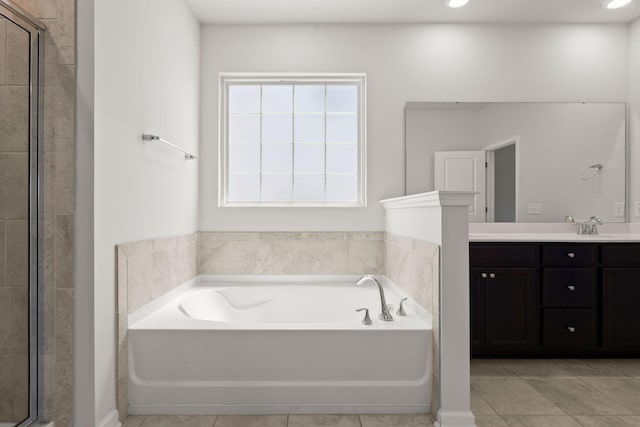 341 Witch Hazel St, Summerville, SC 29486 - full bathroom featuring vanity, a garden tub, a shower stall, tile patterned flooring, and recessed lighting