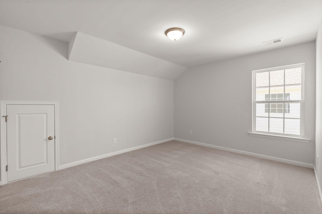 341 Witch Hazel St, Summerville, SC 29486 - additional living space with lofted ceiling, light carpet, and baseboards