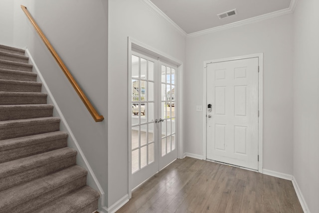 341 Witch Hazel St, Summerville, SC 29486 - foyer with stairway, wood finished floors, crown molding, baseboards, and french doors