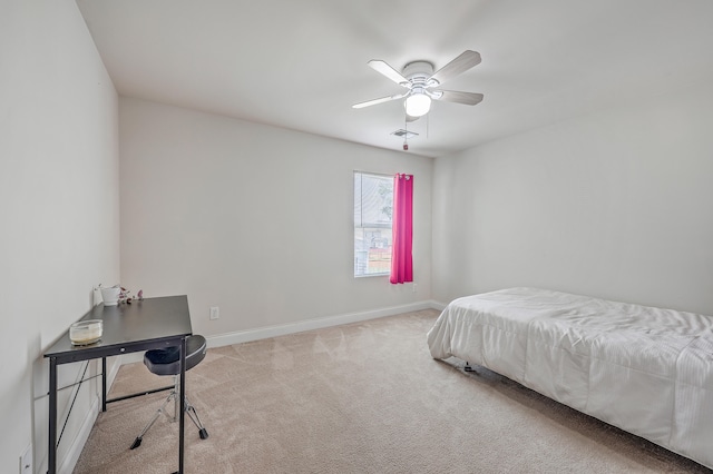 bedroom with ceiling fan and light colored carpet