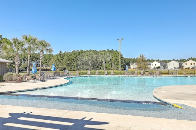 view of pool featuring a patio