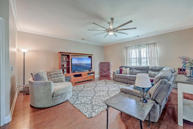 living room featuring ornamental molding, ceiling fan, and dark hardwood / wood-style flooring