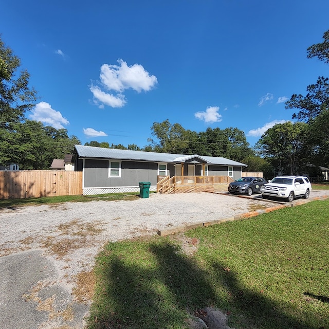 view of front of home with a front lawn