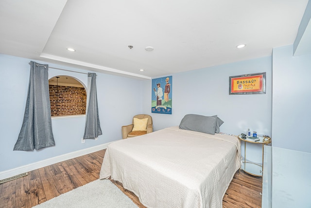 bedroom featuring hardwood / wood-style floors