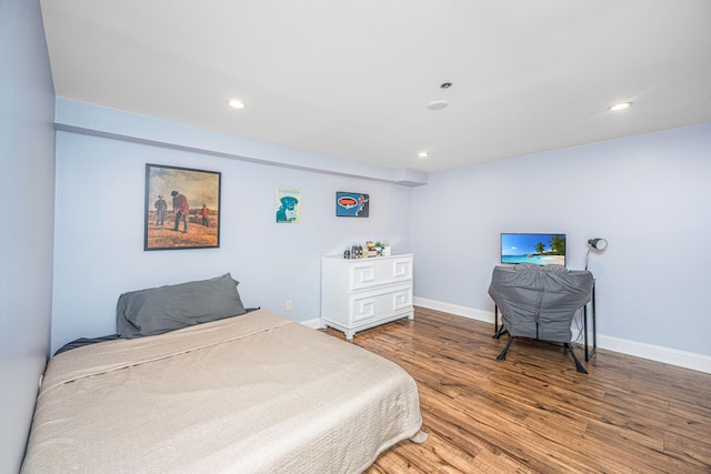 bedroom with wood-type flooring