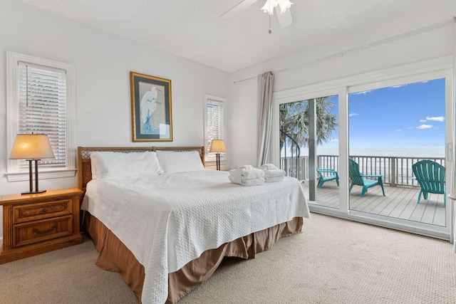 505 E Arctic Ave, Folly Beach, SC 29439 - carpeted bedroom with access to outside, a water view, and ceiling fan