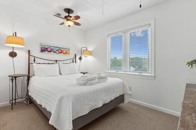 505 E Arctic Ave, Folly Beach, SC 29439 - bedroom featuring carpet floors, attic access, a textured ceiling, and ceiling fan