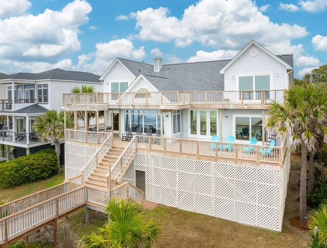 505 E Arctic Ave, Folly Beach, SC 29439 - rear view of property with a balcony, a shingled roof, and stairs