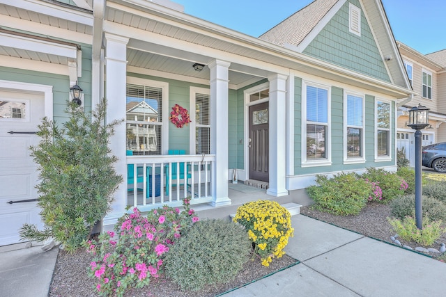 entrance to property featuring a porch