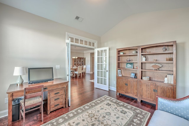 home office with vaulted ceiling, a chandelier, dark hardwood / wood-style flooring, and french doors