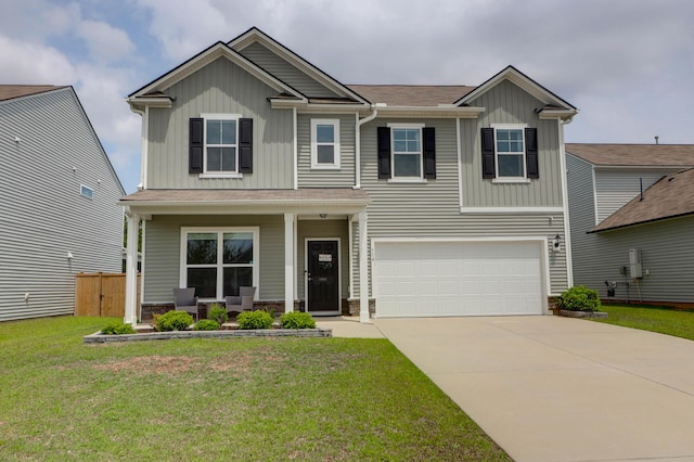 craftsman inspired home with board and batten siding, covered porch, a garage, concrete driveway, and stone siding