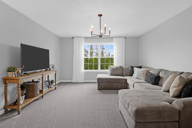 carpeted living room with baseboards and a chandelier