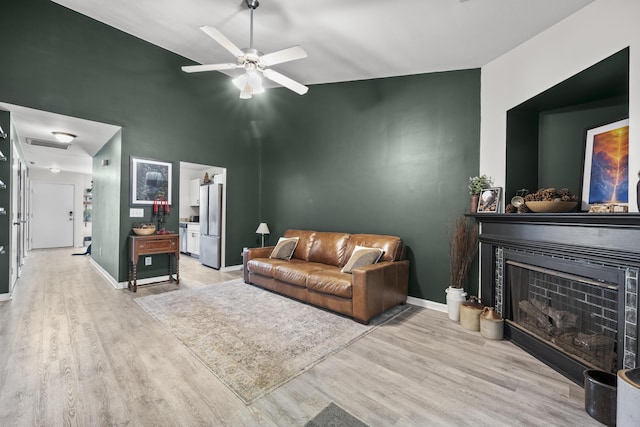 207 Allen Richard Ct Unit B, Moncks Corner, SC 29461 - living area with wood finished floors, baseboards, a high ceiling, and ceiling fan