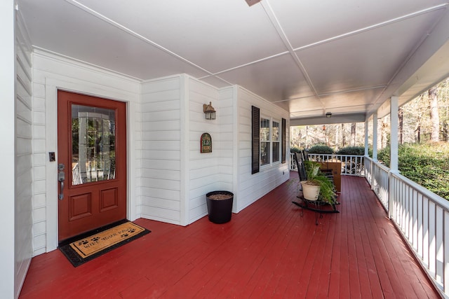 wooden deck featuring covered porch