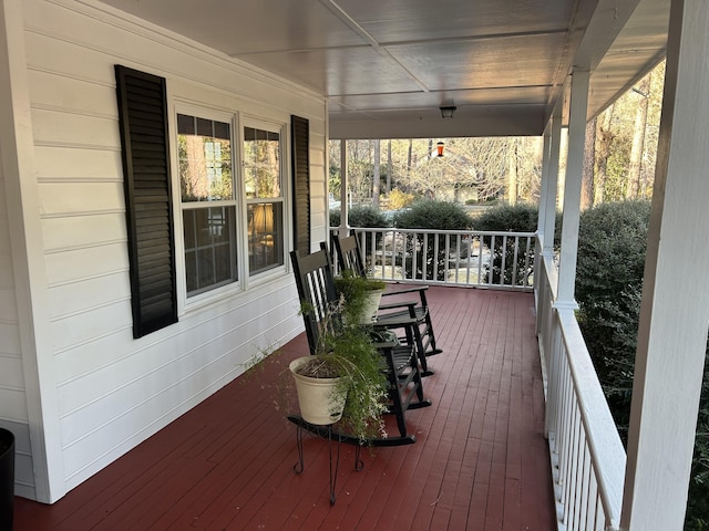 wooden deck featuring a porch