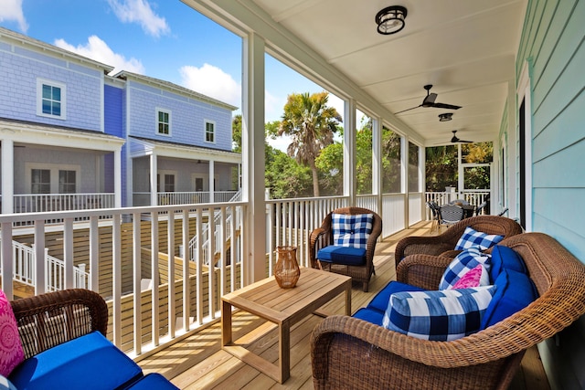 sunroom / solarium with ceiling fan