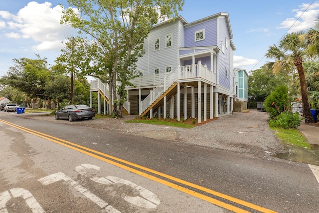 view of front of home featuring stairs