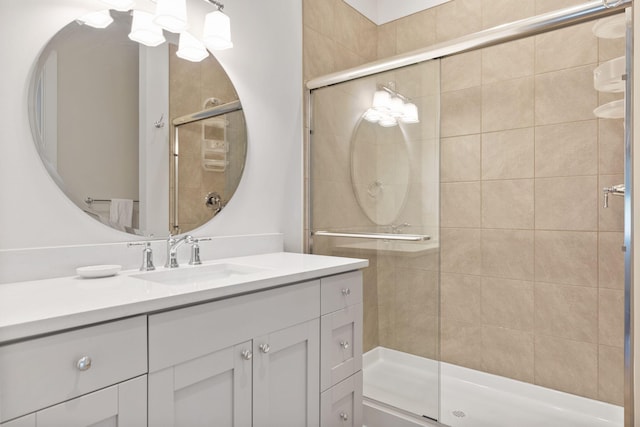 full bath featuring vanity and a stall shower