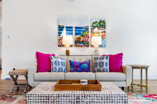 living room with wood finished floors and baseboards