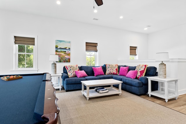 living area with recessed lighting, wood finished floors, visible vents, and ceiling fan