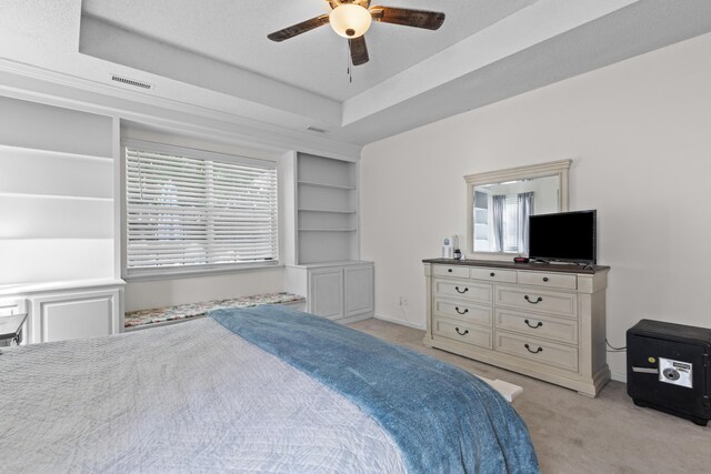 6242 Fieldstone Cir, Charleston, SC 29414 - bedroom with light carpet, baseboards, ceiling fan, and a raised ceiling