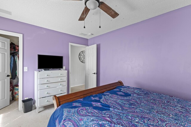 6242 Fieldstone Cir, Charleston, SC 29414 - bedroom featuring carpet flooring, ceiling fan, and a textured ceiling