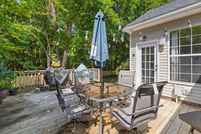 6242 Fieldstone Cir, Charleston, SC 29414 - wooden deck with outdoor dining area and view of scattered trees