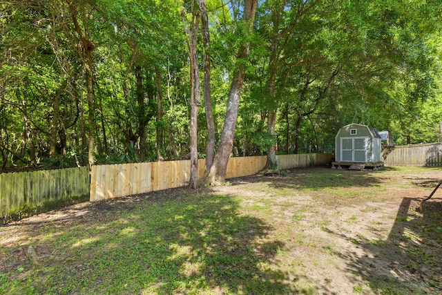 6242 Fieldstone Cir, Charleston, SC 29414 - fenced backyard with a storage unit and an outdoor structure