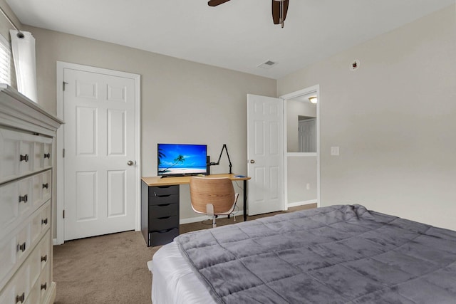 carpeted bedroom featuring ceiling fan