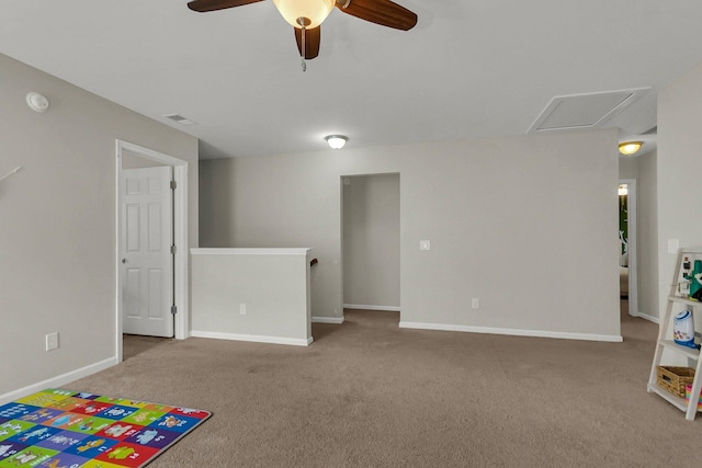 interior space featuring carpet flooring and ceiling fan