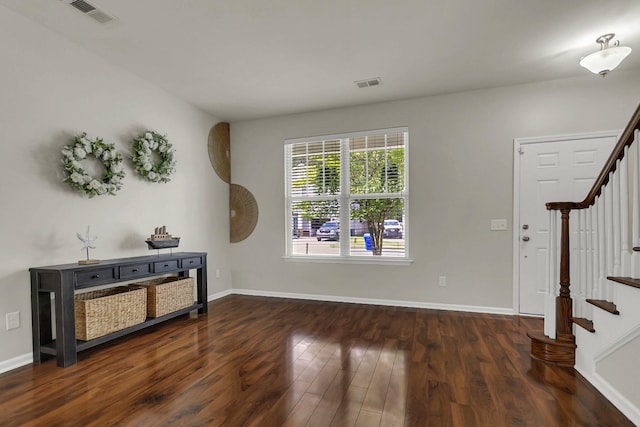 living room featuring dark hardwood / wood-style floors