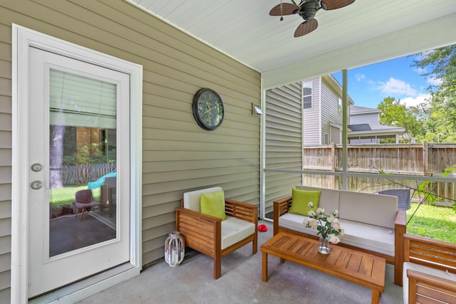 view of patio / terrace with ceiling fan and outdoor lounge area