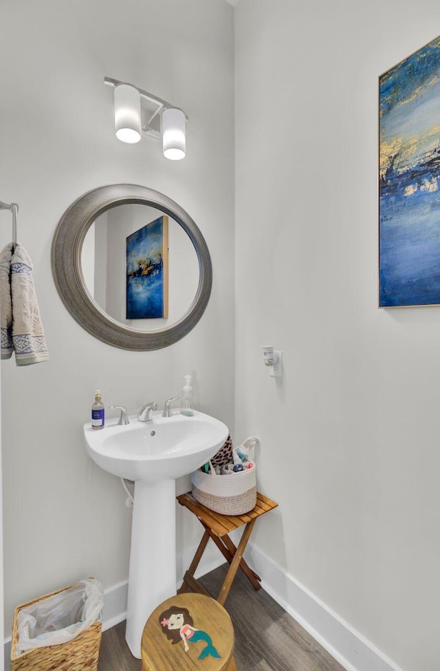 bathroom featuring hardwood / wood-style flooring and sink