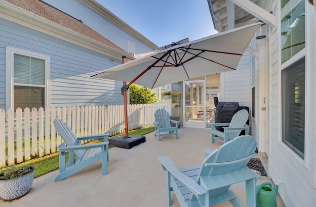 view of patio / terrace with a sunroom