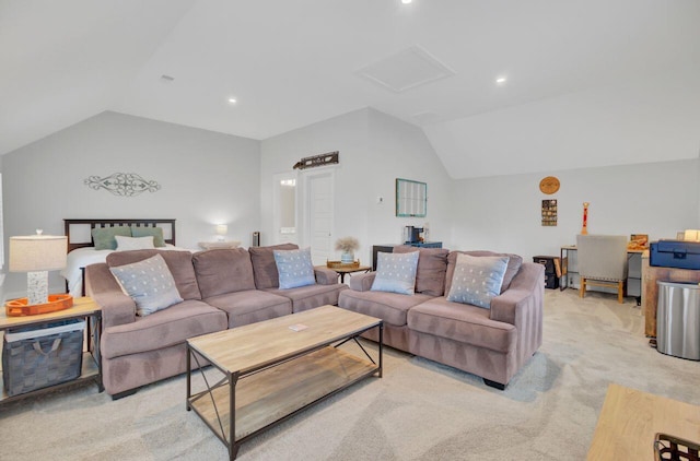 carpeted living room with lofted ceiling