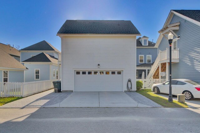 view of front of property featuring a garage