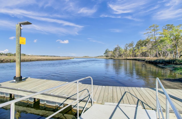 dock area featuring a water view