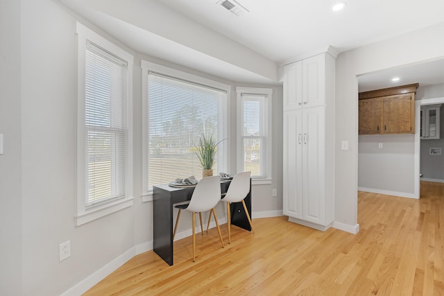 office featuring visible vents, recessed lighting, light wood-type flooring, and baseboards