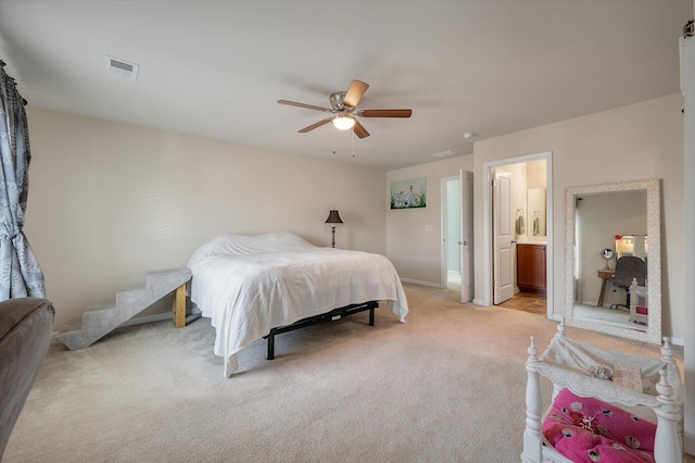 bedroom with baseboards, a ceiling fan, visible vents, and light colored carpet