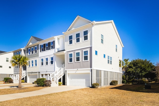 townhome / multi-family property featuring a garage